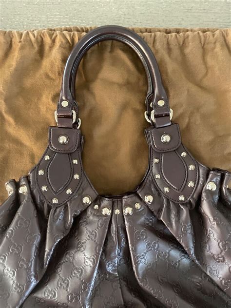 gucci pelham studded hobo leather|GUCCI Guccissima Studded Pelham Shoulder Bag Dark Brown .